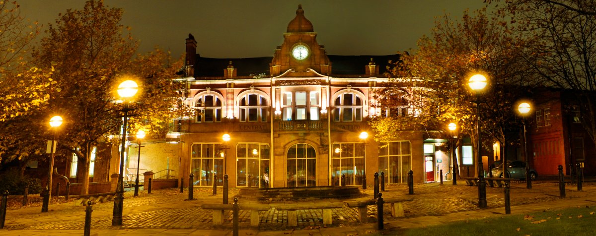 Old Fire Station exterior illuminated at night, University of Salford