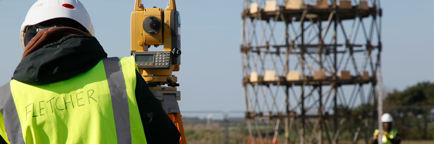 Civil engineering student surveying