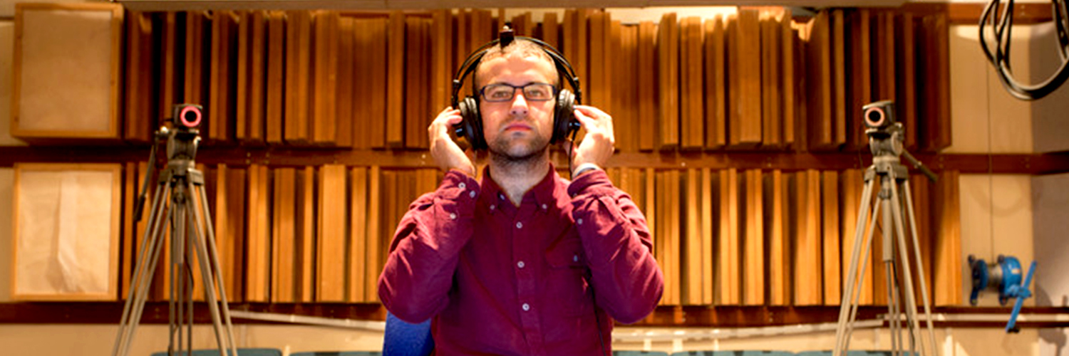 A man testing headphones