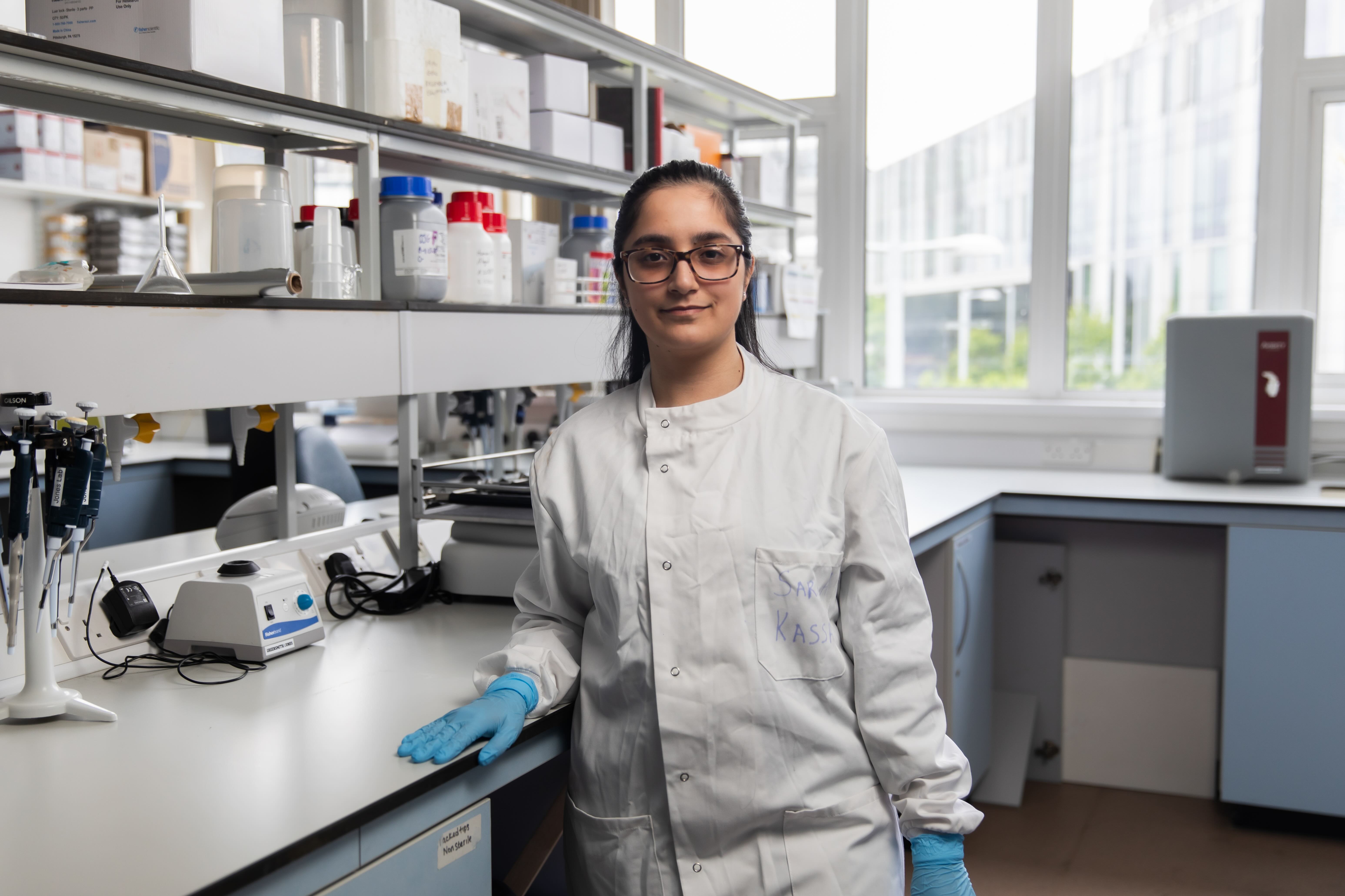 Sara a biomedical science student in a lab at the University of Salford