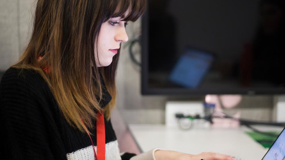 A student working on a laptop