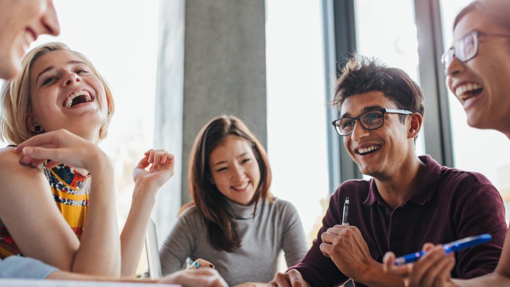Five students in conversation