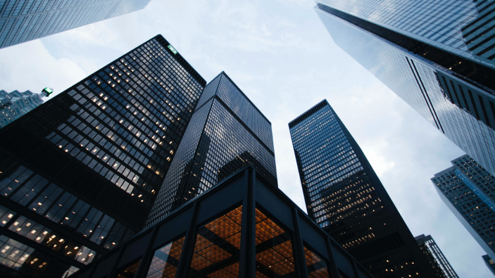 Upward view of multiple skyscrapers