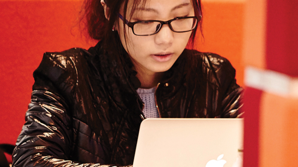 A student uses a laptop to study.