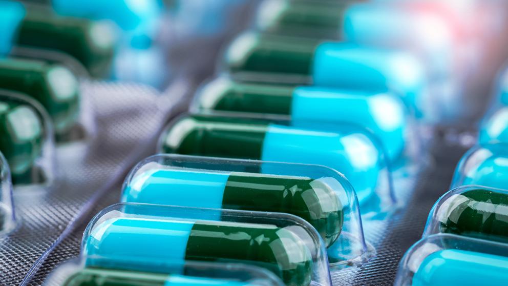 Green and blue medicinal capsules