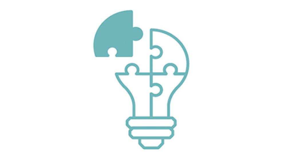 Illustration representing a lightbulb as jigsaw pieces