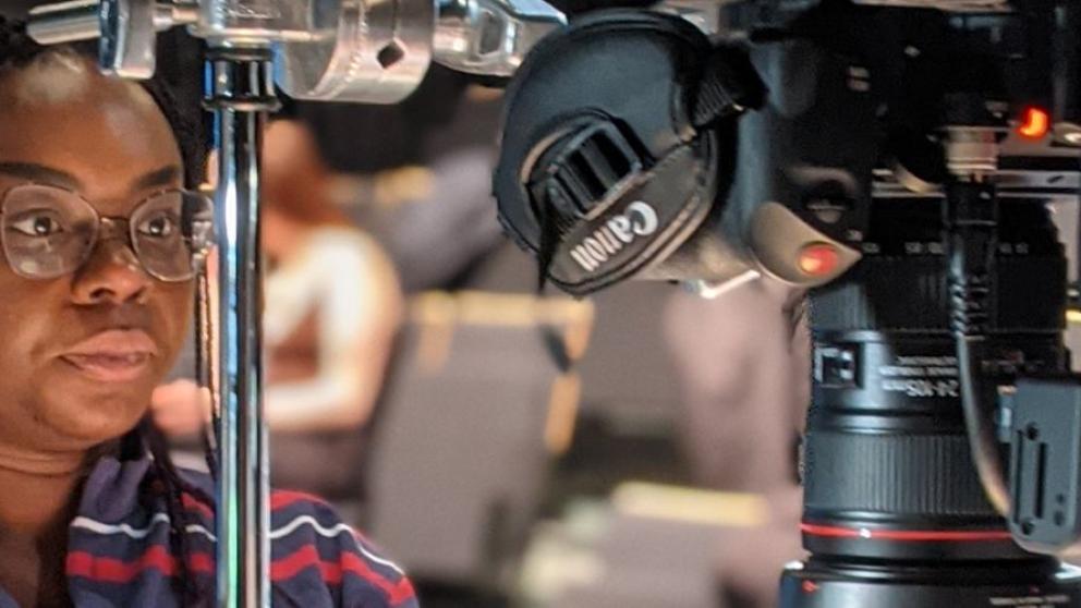 Digital Video Production and Marketing student from University of Salford pictured with a camera