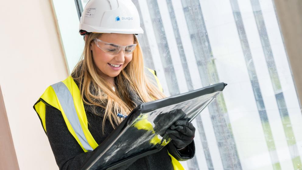 MBA construction apprentice taking notes