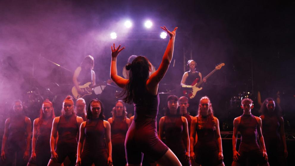 A group of dancers on stage