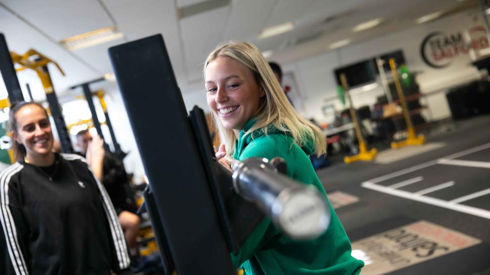 Pic shows young woman in gym