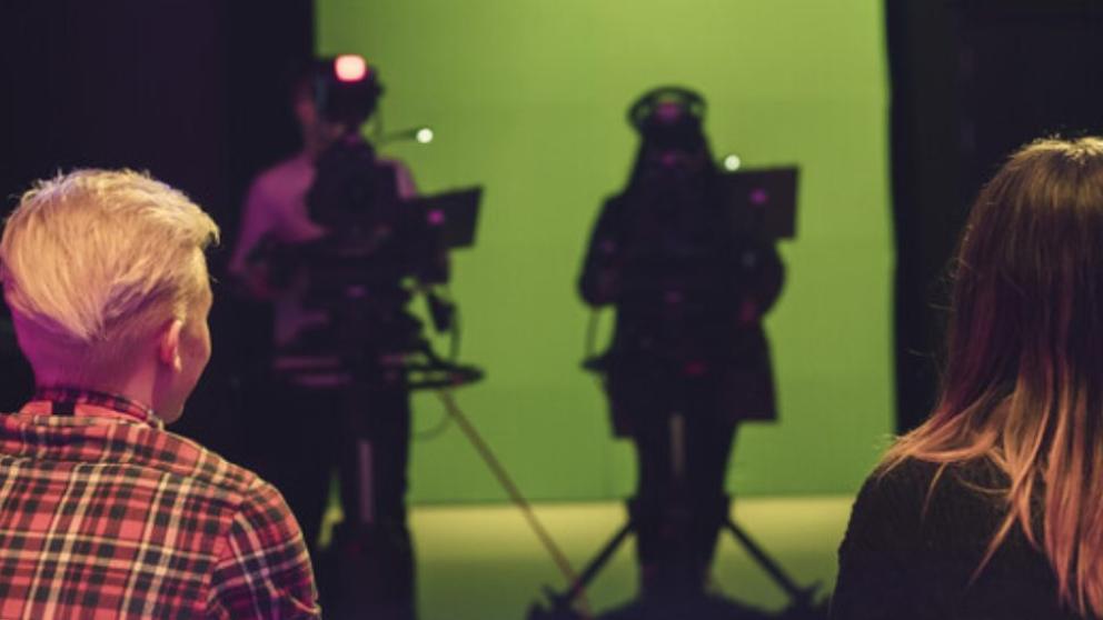 Students using green screen and camera facilities