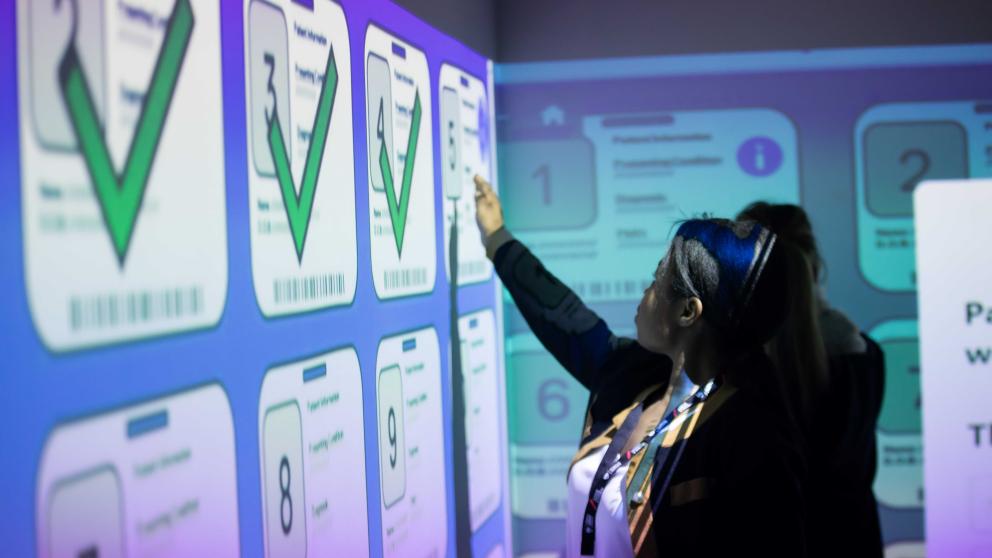 Apprentices using screens in VR suite