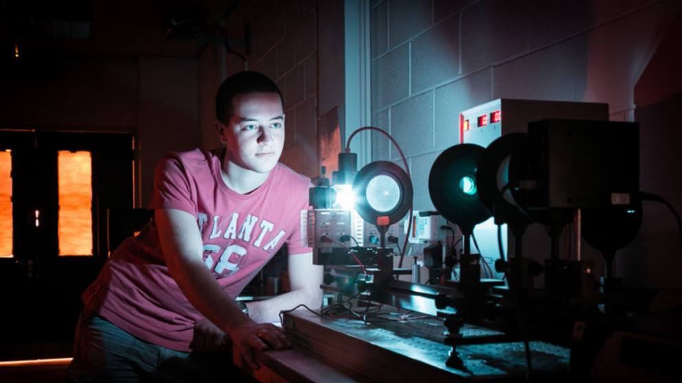 Physics student carrying out an experiment in the Joule Physics Laboratory, University of Salford