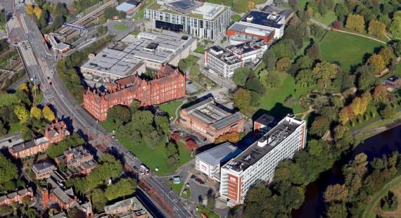 Aerial view of Peel Park campus with buildings and trees