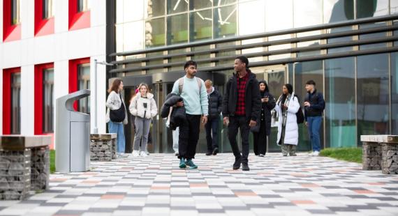 Students outside the Science, Engineering & Environment (SEE) Building