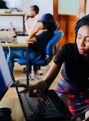 Students work on a computer