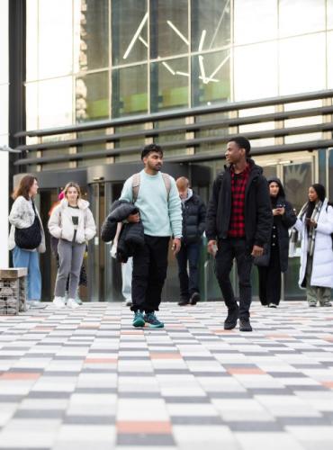 Students outside the Science, Engineering & Environment (SEE) Building